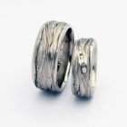 <div class="fancy-desc"><div class="fancy-desc-left"><span class="secondary label radius">wedding rings</span></div><div class="fancy-desc-right"><div class='fb-share-button' data-href='https://www.cf-creation.ch/en/2010_05_asa2010_22/' data-layout='button' data-size='small' data-mobile-iframe='true'></div></div></div>