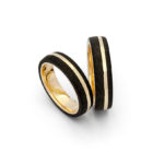 <div class="fancy-desc"><div class="fancy-desc-left"><span class="secondary label radius">wedding rings</span> <span class="secondary label radius">carbon</span> <span class="secondary label radius">gold</span></div><div class="fancy-desc-right"><div class='fb-share-button' data-href='https://www.cf-creation.ch/en/2016_10_mg_6231_web/' data-layout='button' data-size='small' data-mobile-iframe='true'></div></div></div>